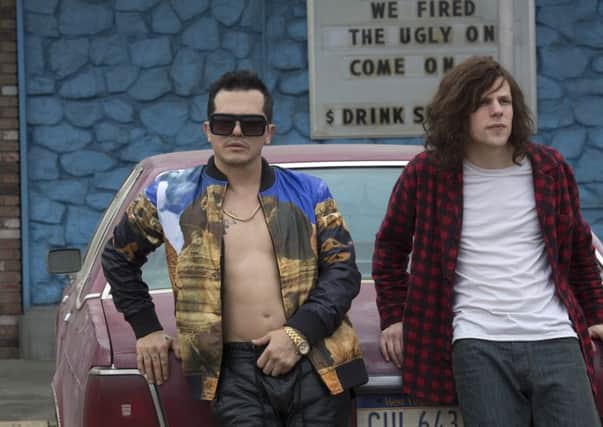 Jesse Eisenberg, right, with John Leguizamo in the ill-judged American Ultra. Picture: Contributed