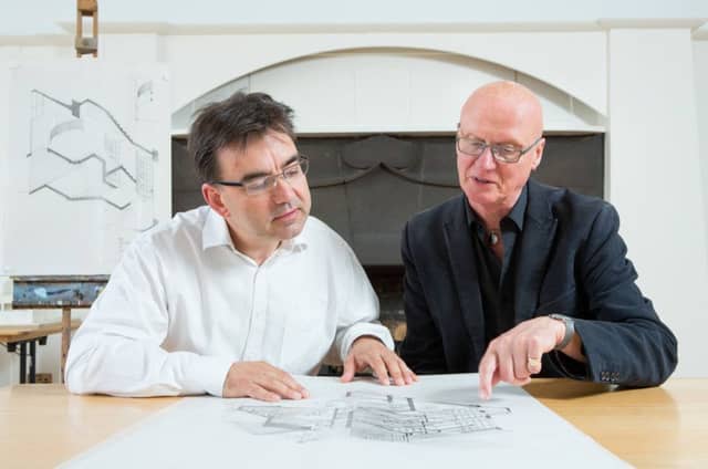 Prof George Cairns (left) and Prof Tom Inns (right) look at some of the special drawings donated to the GSA. Picture: Alan McAteer