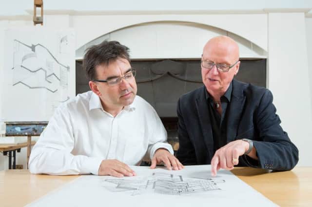 Prof George Cairns (left) and Prof Tom Inns (right) look at some of the special drawings donated to the GSA. Picture:  Alan McAteer