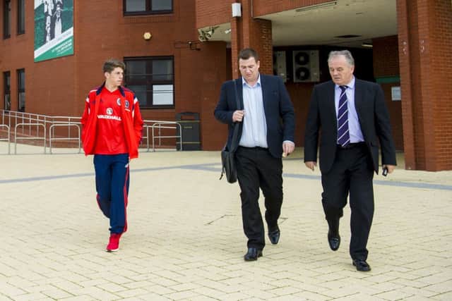 Ryan Christie, left, leaves Celtic Park after holding talks with the club. Picture: SNS