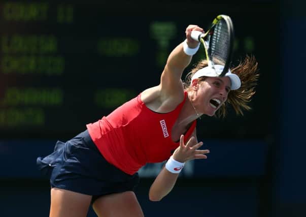 Johanna Konta serves to Louisa Chirico en route to victory in the first round of the US Open. Picture: Clive Brunskill/Getty Images