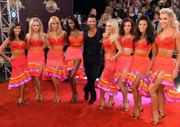Peter Andre lines up with Janette Manrara, Ola Jordan, Aliona Vilani, Otile Mabuse, Kristina Rihanoff, Joanne Clifton, Karen Clifton and Natalie Lowe for the launch of Strictly. Picture: Getty