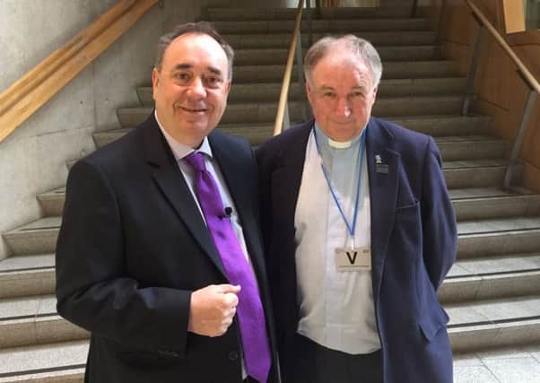 Alex Salmond MP and Rev Stuart MacQuarrie in the Garden Lobby of the Scottish Parliament in Edinburgh. Picture: Hemedia