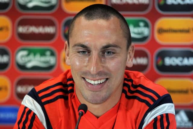 Scotland captain Scott Brown is all smiles in Tbilisi yesterday. Picture: Vano Shlamov/AFP/Getty Images