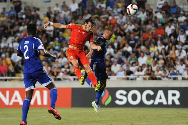 Gareth Bale heads home the only goal of the game as Wales clinched a precious win over Cyprus at the GSP Stadium. Picture: PA