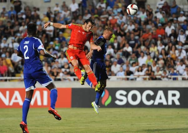 Gareth Bale heads home the only goal of the game as Wales clinched a precious win over Cyprus at the GSP Stadium. Picture: PA