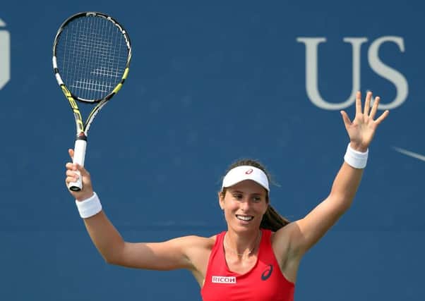 Britain's Johanna Konta celebrates after defeating No 9 seed Garbine Muguruza in their second round match yesterday. Picture: Getty