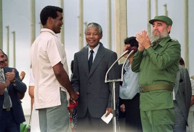 On this day in 1991 Nelson Mandela, pictured with Fidel Castro, was named as president of the African National Congress. Picture: AFP/Getty