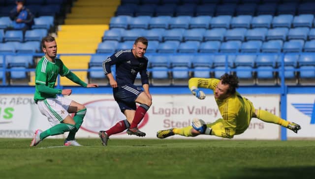 Scotland's Ryan Fraser scores what turned out to be the winning goal against Northern Ireland. Picture: PA