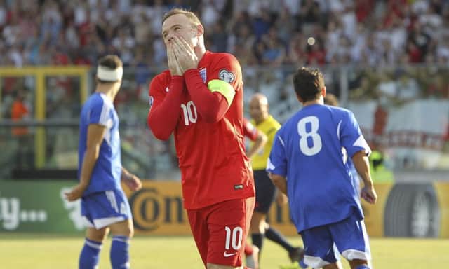 England's Wayne Rooney celebrates after scoring his 49th international goal against San Marino. Picture: Marco Luzzani/Getty Images