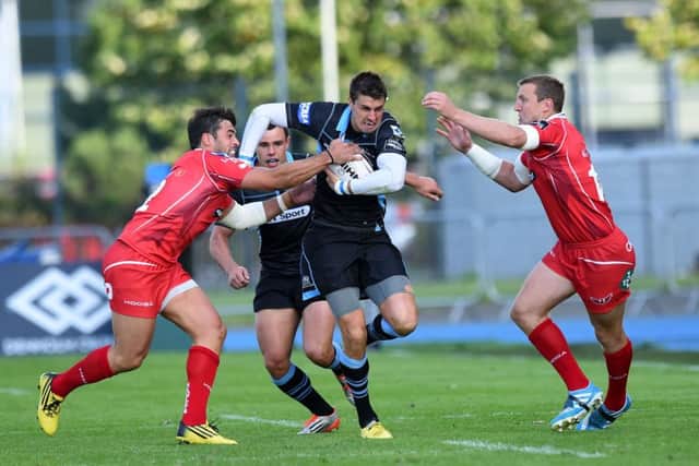 Peter Murchie drives forward for the hosts who would eventually fall to Scarlets. Picture: SNS
