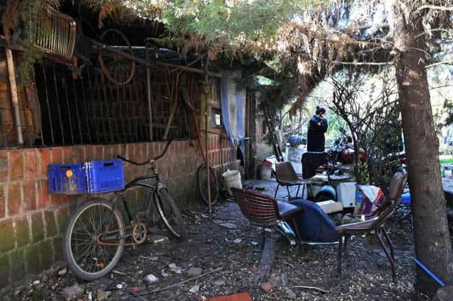 The filthy rubble-strewn house of Eduardo Oviedo in Argentina, where he kept his wife and autistic son locked in a cage. Picture: Getty