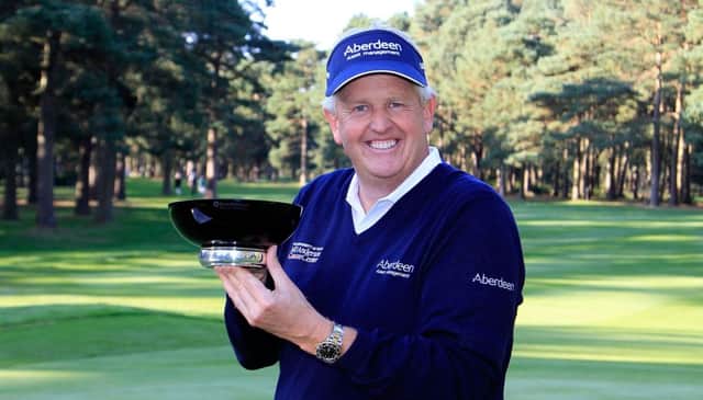Colin Montgomerie poses with the trophy. Picture: Getty