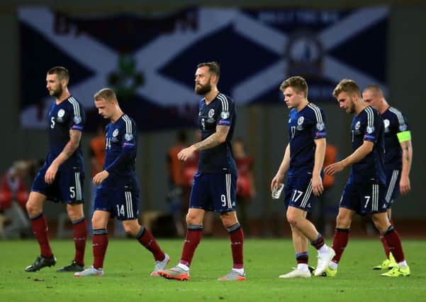 Steven Fletcher, centre, will keep his starting berth for Scotland against Germany. Picture: PA