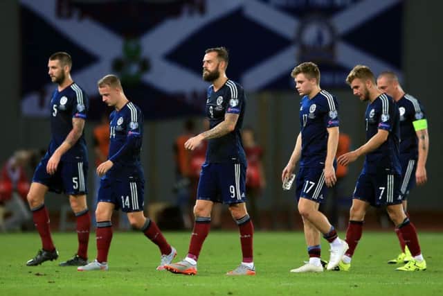 Steven Fletcher, centre, will keep his starting berth for Scotland against Germany. Picture: PA