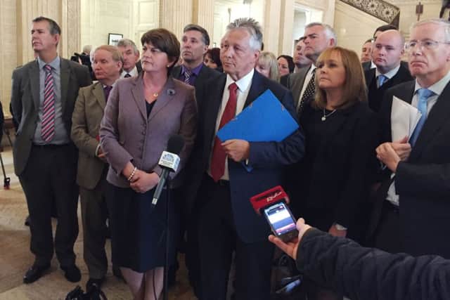 Northern Ireland First Minister Peter Robinson, centre, at the Stormont parliament in Belfast yesterday. Picture: PA