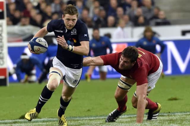 Finn Russell, evading French lock Alexandre Flanquart, says the Scots warm-up displays were encouraging. Picture: AFP/Getty