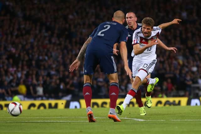 Thomas Muller shoots to score the opening goal. Picture: Getty