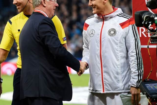Sir Alex Ferguson meets Bastian Schweinsteiger before kick-off. Picture: Craig Williamson/SNS