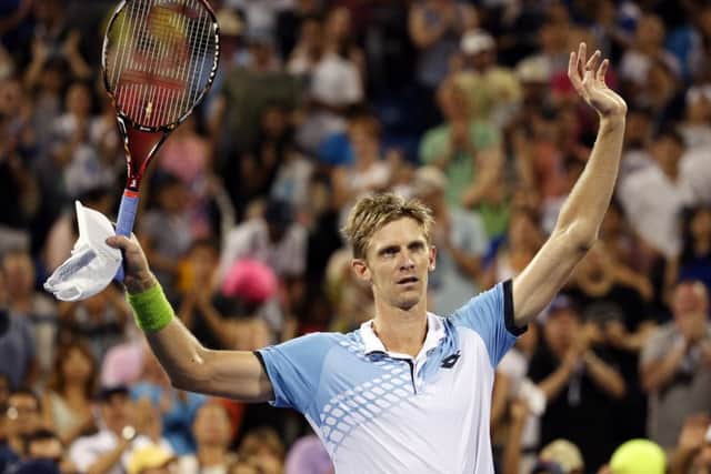South African Kevin Anderson salutes the crowd after his shock victory over Murray. Picture: AP