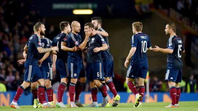 Scotland can be proud of their performance against Germany, while Gordon Strachan hasn't given up hope of reaching Euro 2016. Picture: SNS