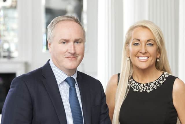 Derek Weir, left, with Marie Macklin, right