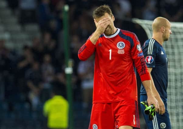 David Marshall reacts to Scotland's 3-2 defeat to Germany. Picture: SNS