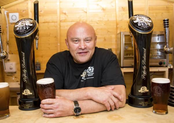 Former England international Brian Moore at the Three Sisters pub in Edinburgh - an official fans hub for the World Cup. Picture: Craig Watson
