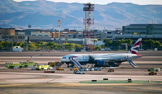The BA flight surrounded by emergency vehicles at McCarran International Airport following a fire onboard. Picture: Getty