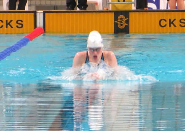 Erin Robertson claimed Scotlands first gold medal in Samoa with victory in the 50m breaststroke
