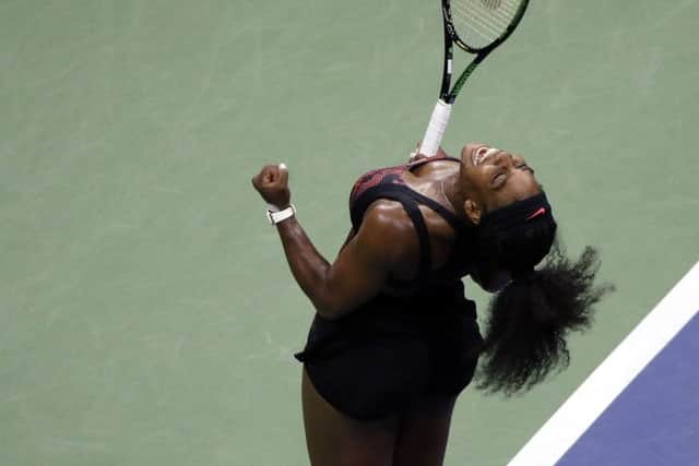 Serena Williams celebrates after her threeset victory over sister Venus at the US Open. Picture: Getty
