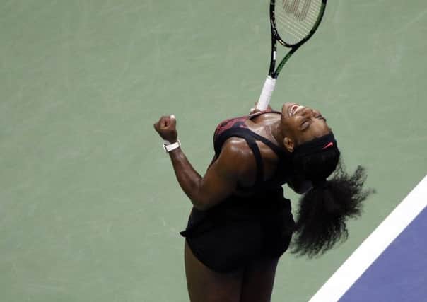 Serena Williams celebrates after her threeset victory over sister Venus at the US Open. Picture: Getty