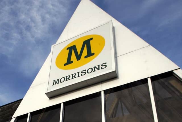 Morrisons posted a slump in first-half profits