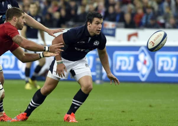 John Hardie in action for Scotland against France at the Stade de France.  Picture: Loic Venance/AFP/Getty Images