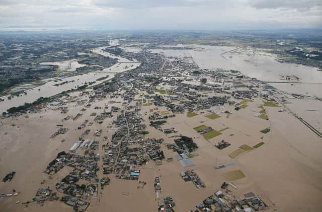 An aerial view shows a flooded area in the city of Joso yesterday, which was inundated when Kinugawa river burst its banks. Picture: AFP/Getty