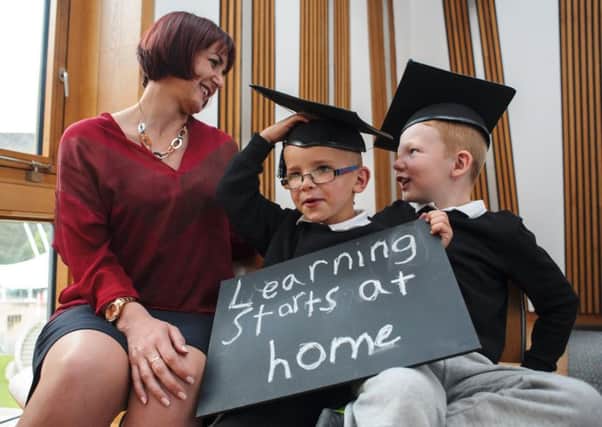 Max Baxter and Ryder McCardle from Gracemount Primary with education secretary Angela Constance. Picture: Callum Bennetts