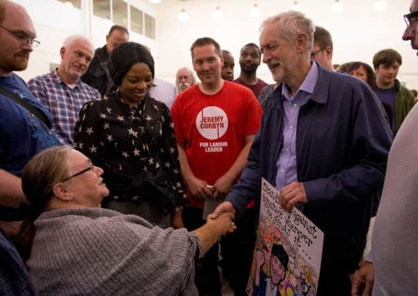 Corbyn talks to supporters in Nuneaton, Warwickshire, after a final regional rally. Picture: Getty