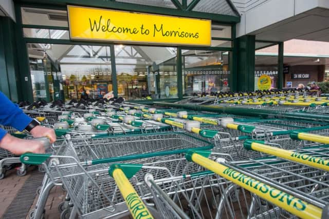 Morrisons headed lower after a slide in profits