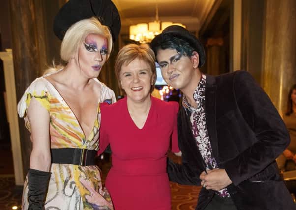 Ms Sturgeon with two of the event's guests. Picture: Robert Perry