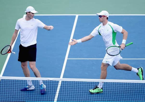 Jamie Murray and John Peers celebrate a point against Marcin Matkowski and Nenad Zimonjic. Picture: Getty
