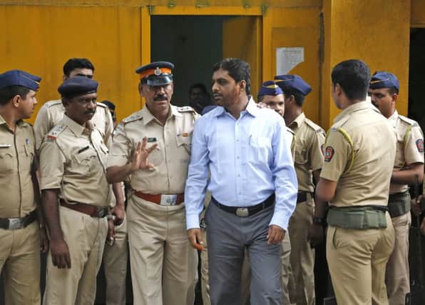 One of the defendants leaves court in Mumbai for prison after sentencing following the 2006 bombings. Picture: AP