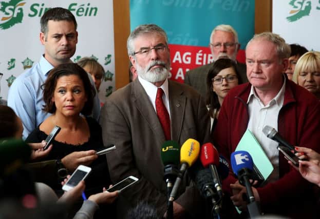 Sinn Feins Gerry Adams and Martin McGuinness address the media yesterday over the unfolding crisis. Picture: PA