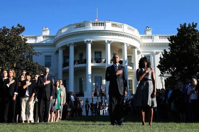 President Obama and first lady Michelle mark the 14th anniversay of the 911 attacks. Picture: Getty