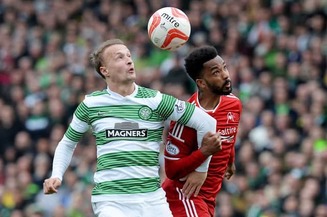 Aberdeen's Shay Logan battles with Leigh Griffiths of Celtic at Pittodrie last season. Picture: SNS