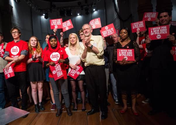 Jeremy Corbyn is joined on stage by supporters after speaking at the Rock Tower this week. Picture: Getty