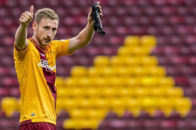 Motherwell's Louis Moult celebrates at full time. Picture: SNS