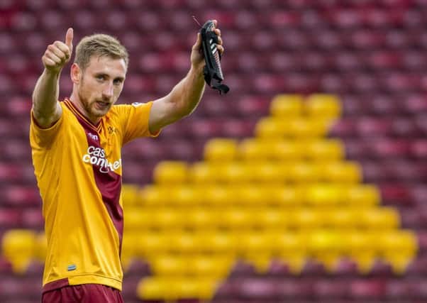 Motherwell's Louis Moult celebrates at full time. Picture: SNS