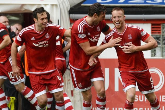 Adam Rooney (right) celebrates his goal. Picture: SNS