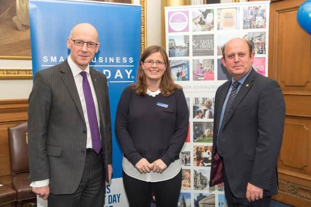 Deputy First Minister John Swinney with Michelle Ovens, Small Business Saturday campaign director, and councillor Frank Ross