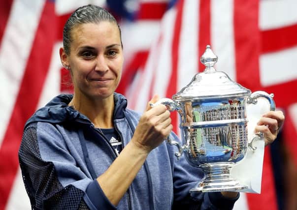 Flavia Pennetta celebrates with the trophy after winning the all-Italian US Open final. Picture: Getty